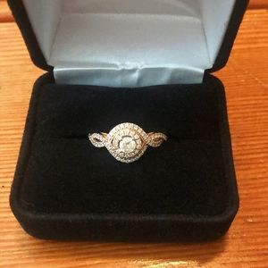 Kay jewelers 14 Karat rose gold ring set.
